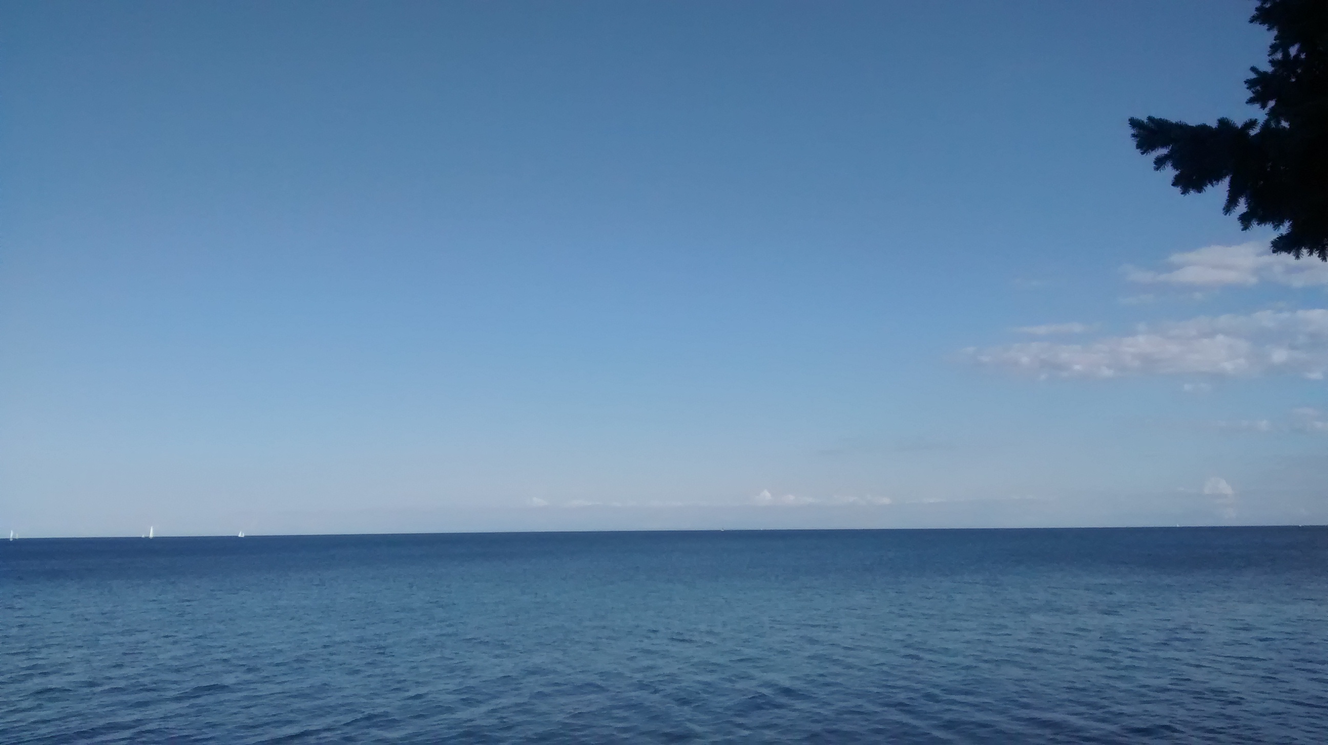 blue lake, with blue horizon
