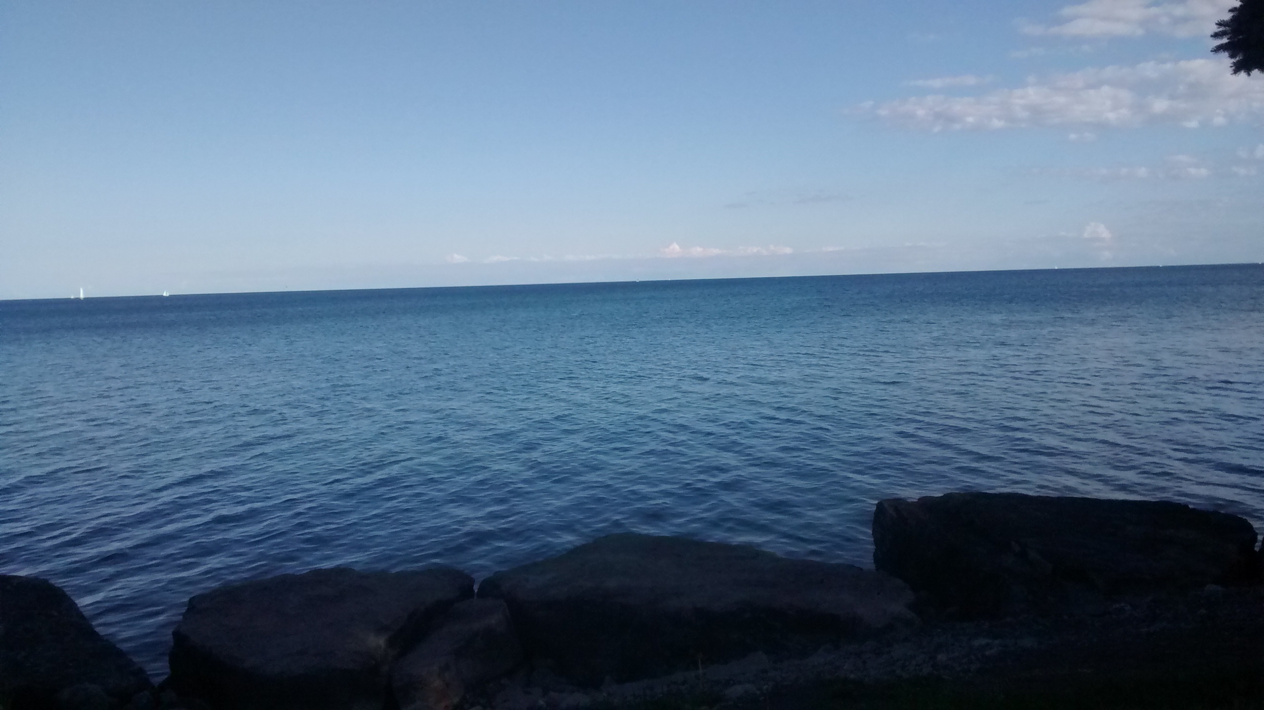blue lake, with blue horizon
